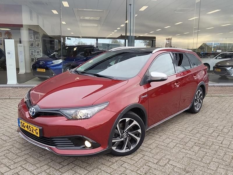 Rood (metallic) Gebruikt 2018 Toyota Auris Touring Sports Stationwagen | € 17.495 (Eerlijke prijs) - Afbeelding 1/4