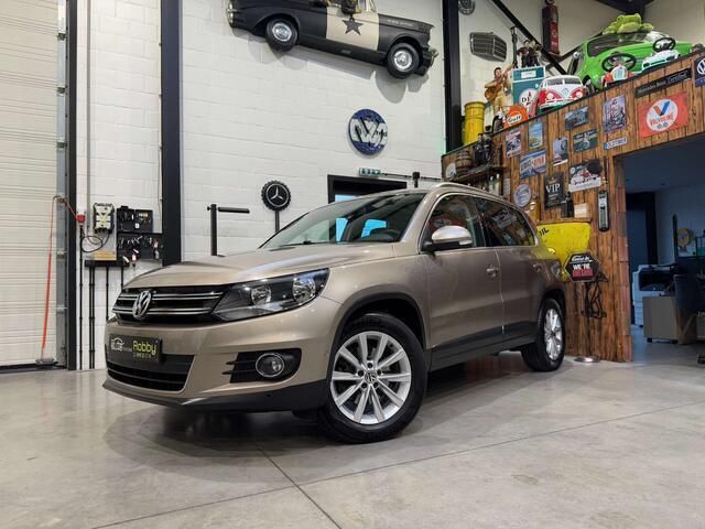 Grijs Gebruikt 2015 VW Tiguan SUV | € 12.950 (Eerlijke prijs) - Afbeelding 1/4