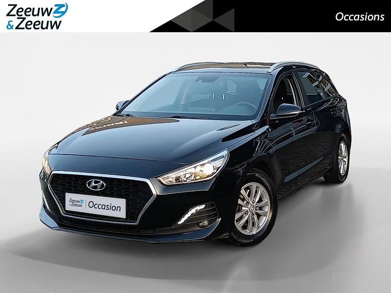 Phantom black metallic/phantom black pearl (pae) Gebruikt 2019 Hyundai i30 Comfort Stationwagen | € 12.950 (Eerlijke prijs) - Afbeelding 1/4