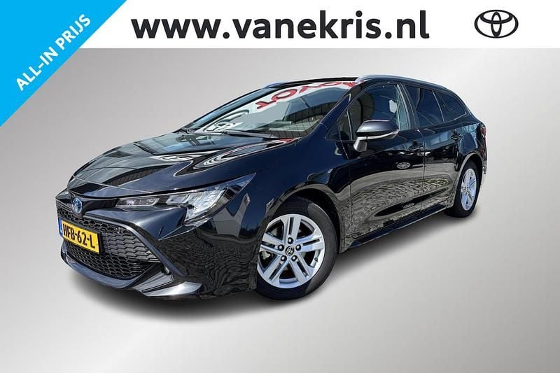 Zwart Gebruikt 2024 Toyota Corolla Hybrid Business Edition Stationwagen | € 31.499 - Afbeelding 1/4