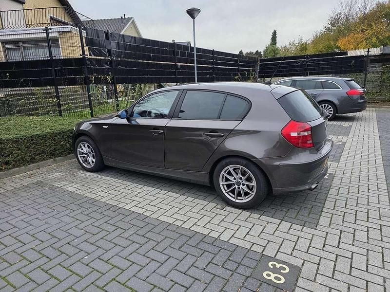 Bruin Gebruikt 2007 BMW 116 Hatchback | € 2.500 (Goede deal) - Afbeelding 1/4