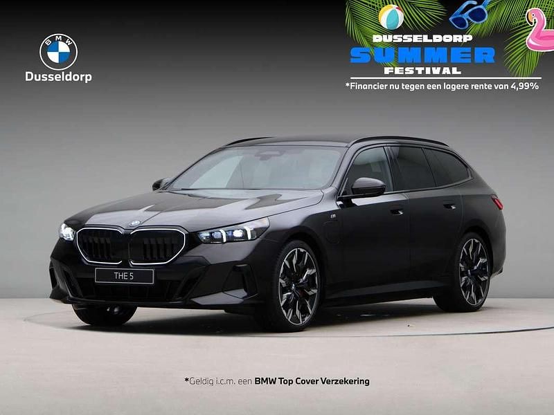 Bruin Nieuw 2025 BMW 550e Comfort Edition Stationwagen | € 120.614 - Afbeelding 1/4