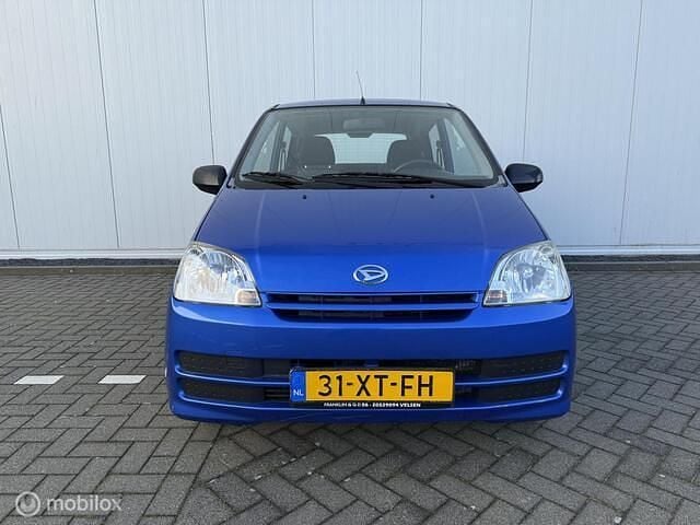 Occasion Daihatsu Cuore 58 PK (42 kW) 2007 Blauw Hatchback