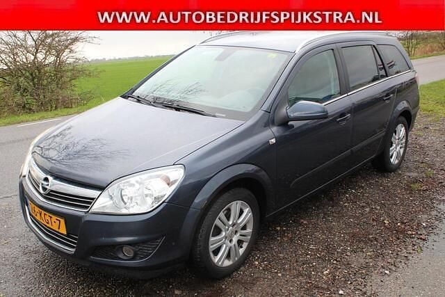 Grijs (metallic) Gebruikt 2009 Opel Astra Cosmo Stationwagen | € 1.699 (Goede deal) - Afbeelding 1/4