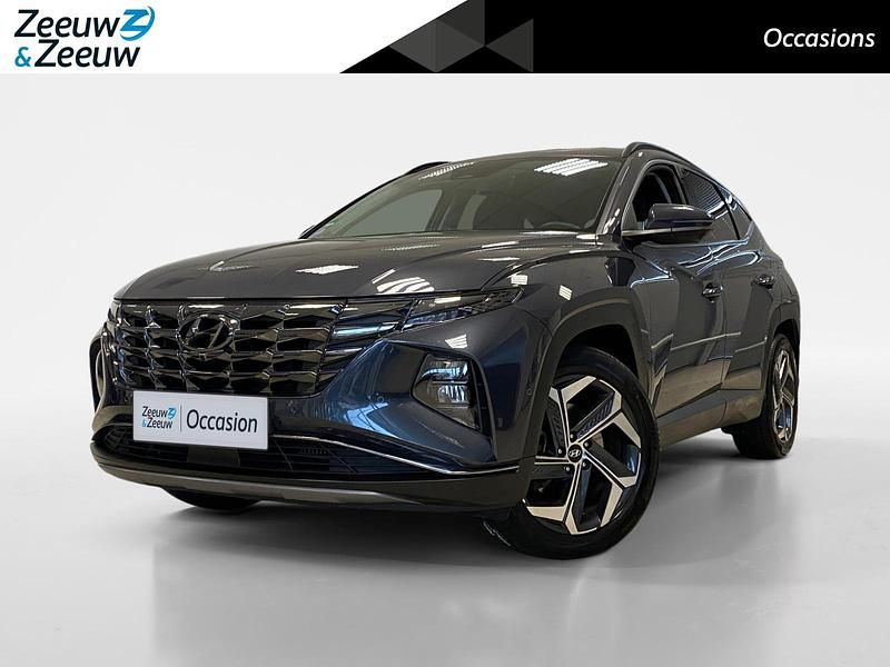 Dark knight pearl (yg7) Occasion 2022 Hyundai Tucson Premium SUV | € 30.450 (Eerlijke prijs) - Afbeelding 1/4