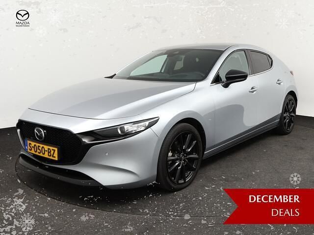 Sonic silver (grijs metallic) Gebruikt 2023 Mazda 3 Homura-Line Hatchback | € 25.940 (Eerlijke prijs) - Afbeelding 1/4