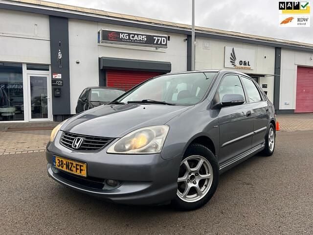 Grijs Gebruikt 2004 Honda Civic LS Hatchback | € 2.250 (Iets duurder) - Afbeelding 1/4