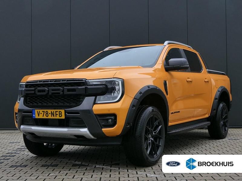 Oranje Occasion 2025 Ford Ranger Wildtrack Pickup | € 58.950 - Afbeelding 1/4
