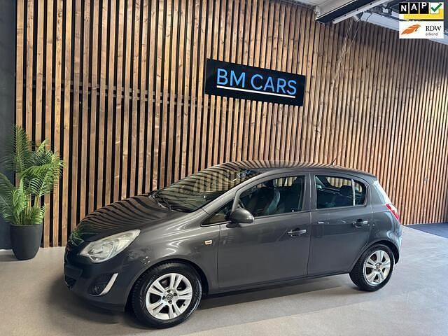Grijs Gebruikt 2012 Opel Corsa Hatchback | € 4.995 (Eerlijke prijs) - Afbeelding 1/4