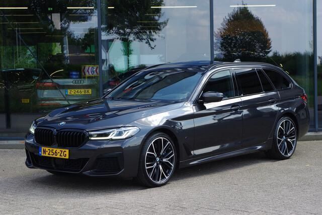 Grijs Gebruikt 2021 BMW 540 Executive Stationwagen | € 44.950 (Eerlijke prijs) - Afbeelding 1/4