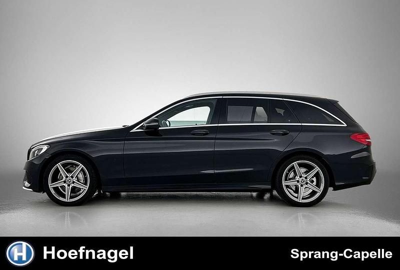 Occasion Mercedes C180 AMG line 157 PK (115 kW) 2018 Zwart Stationwagen