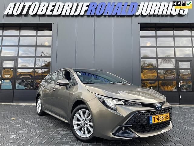 Bruin Occasion 2023 Toyota Corolla Active Stationwagen | € 22.950 (Eerlijke prijs) - Afbeelding 1/4