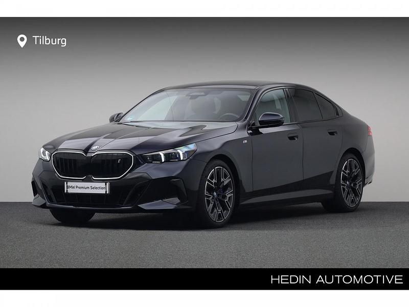 M carbonschwarz metallic (zwart metallic) Gebruikt 2024 BMW i5 Comfort Edition Sedan | € 61.440 - Afbeelding 1/4
