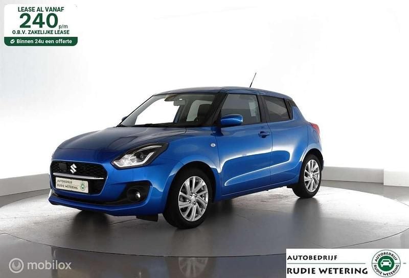 , metallic lak Gebruikt 2024 Suzuki Swift Style Hatchback | € 17.950 (Goede deal) - Afbeelding 1/4