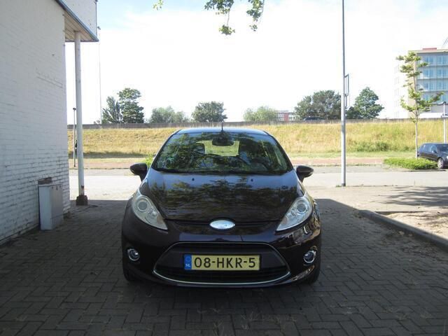 Paars Gebruikt 2009 Ford Fiesta Titanium Hatchback | € 4.250 (Iets duurder) - Afbeelding 1/4