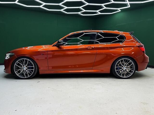 Occasion BMW M135 Comfort Edition 320 PK (235 kW) 2013 Oranje Hatchback