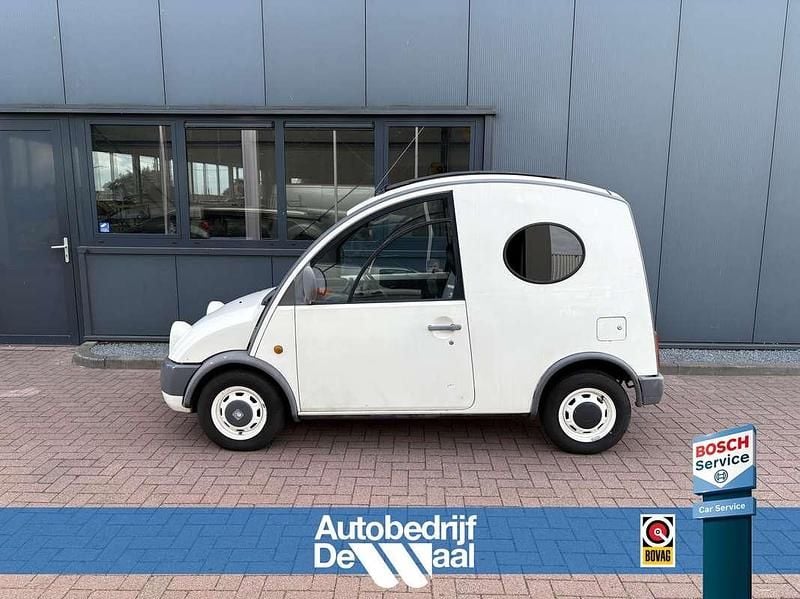 Wit Occasion 1991 Nissan Cargo S Van | € 8.250 - Afbeelding 1/4