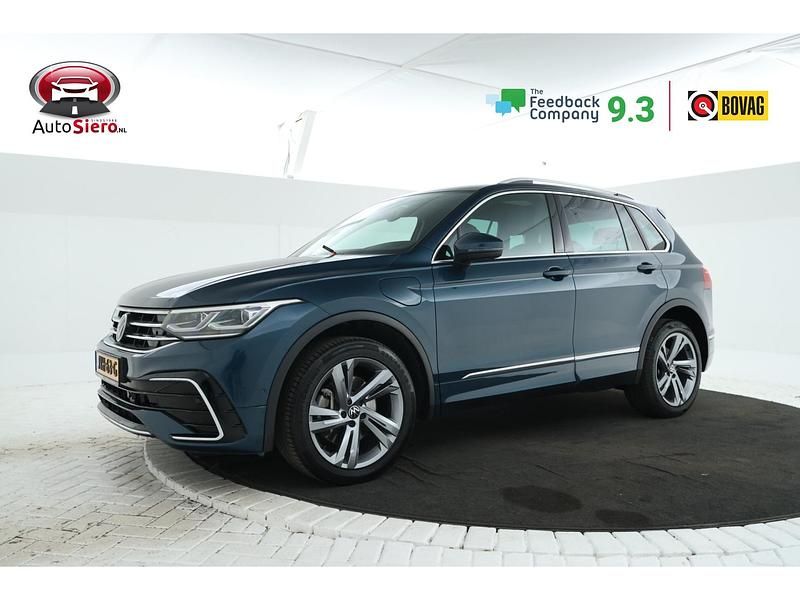 Groen (metallic) Occasion 2021 VW Tiguan R-line SUV | € 28.995 (Eerlijke prijs) - Afbeelding 1/4