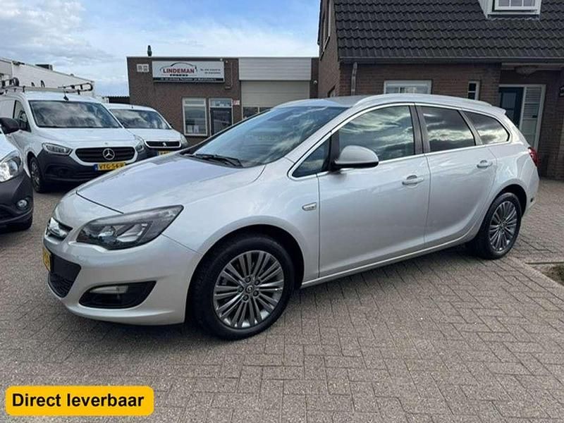 Grijs Gebruikt 2014 Opel Astra Business Stationwagen | € 6.950 (Goede deal) - Afbeelding 1/4