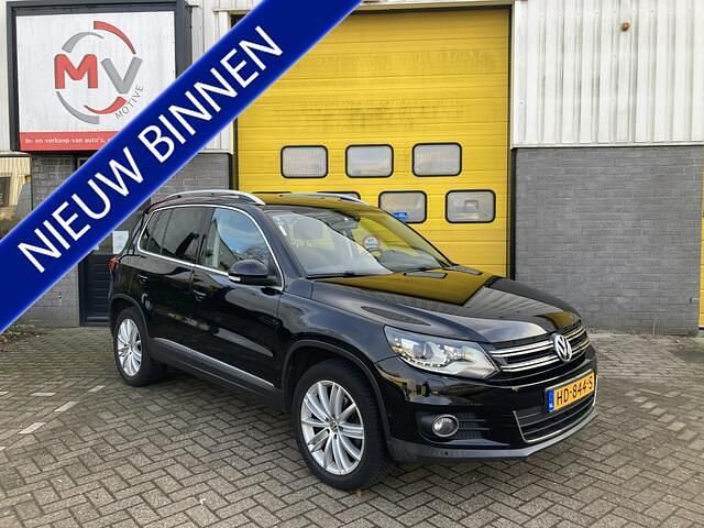 Zwart (metallic) Occasion 2011 VW Tiguan Sport SUV | € 9.995 (Eerlijke prijs) - Afbeelding 1/4