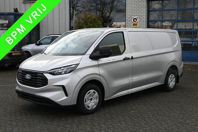 Zilver (metallic) Gebruikt 2024 Ford Transit Custom Trend Van | € 35.950 (Eerlijke prijs) - Afbeelding 1/4