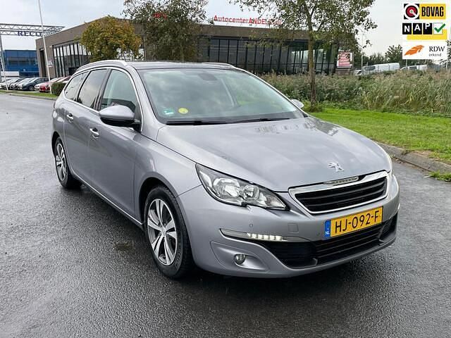 Grijs, metallic lak Gebruikt 2015 Peugeot 308 Stationwagen | € 4.450 (Eerlijke prijs) - Afbeelding 1/4