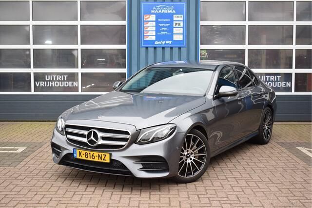 Grijs, metallic lak Gebruikt 2016 Mercedes E200 AMG Sedan | € 27.650 (Eerlijke prijs) - Afbeelding 1/4