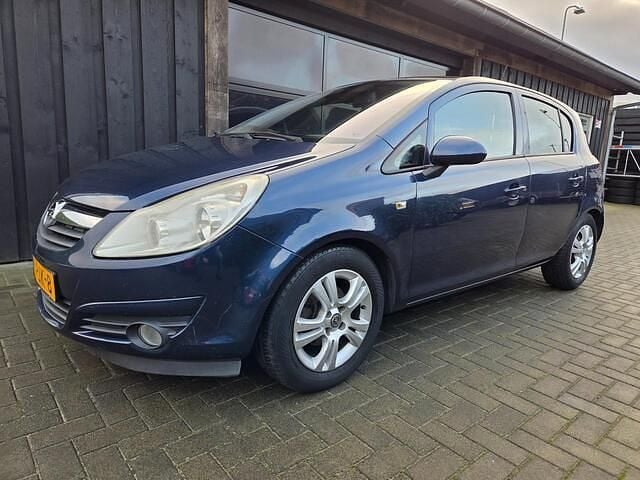 Blauw (metallic) Occasion 2011 Opel Corsa Cosmo Hatchback | € 1.645 (Goede deal) - Afbeelding 1/4