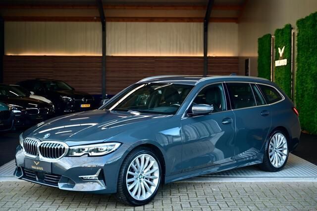 Grijs, metallic lak Gebruikt 2019 BMW 330 Executive Stationwagen | € 25.950 (Iets duurder) - Afbeelding 1/4