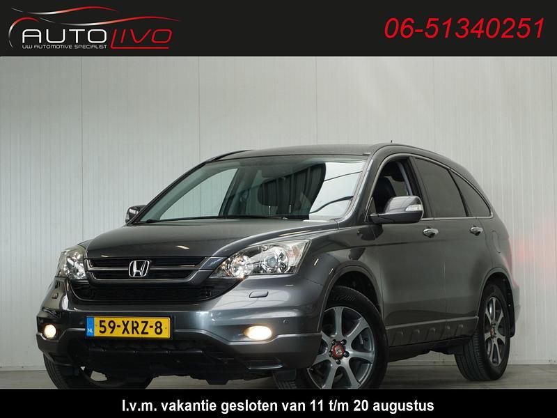 Grijs, metallic lak Gebruikt 2012 Honda CR-V Executive SUV | € 10.995 (Eerlijke prijs) - Afbeelding 1/4