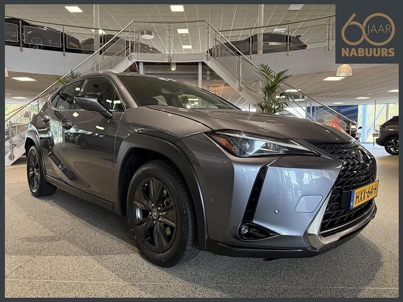 Grijs Gebruikt 2019 Lexus UX 250h Luxury Line SUV | € 26.900 (Eerlijke prijs) - Afbeelding 1/4
