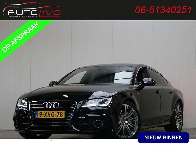 Zwart (metallic) Gebruikt 2014 Audi A7 Sportback Proline Hatchback | € 29.995 - Afbeelding 1/4