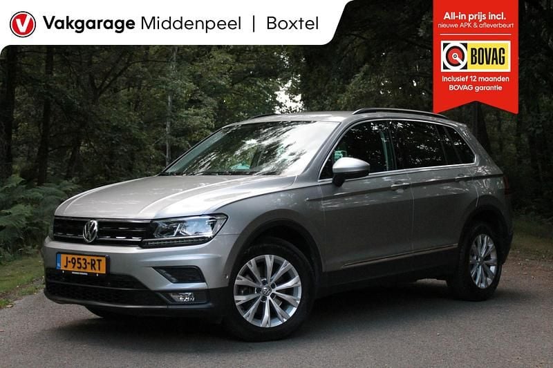 Grijs Gebruikt 2019 VW Tiguan Comfortline SUV | € 26.450 (Goede deal) - Afbeelding 1/4