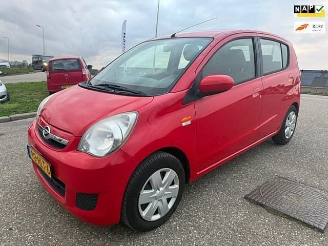 Rood Occasion 2009 Daihatsu Cuore Hatchback | € 3.499 (Iets duurder) - Afbeelding 1/4