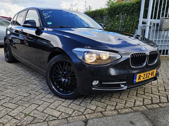 Zwart Gebruikt 2012 BMW 116 Hatchback | € 4.900 (Eerlijke prijs) - Afbeelding 1/4