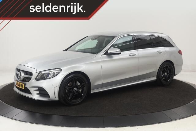 Grijs Gebruikt 2019 Mercedes C180 AMG Stationwagen | € 20.900 (Goede deal) - Afbeelding 1/4