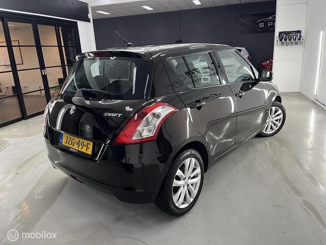 Occasion Suzuki Swift 90 PK (66 kW) 2014 Bruin (metallic) Hatchback