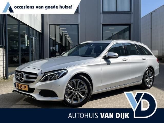 Grijs, metallic lak Gebruikt 2017 Mercedes C180 Business Stationwagen | € 21.940 (Eerlijke prijs) - Afbeelding 1/4