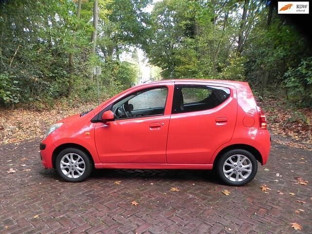 Rood Gebruikt 2010 Nissan Pixo Acenta Hatchback | € 3.450 (Eerlijke prijs) - Afbeelding 1/4