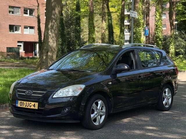 Zwart Gebruikt 2009 Kia Ceed 2 Stationwagen | € 1.250 (Super prijs) - Afbeelding 1/4