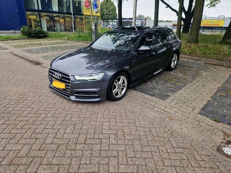 Blauw Gebruikt 2018 Audi A6 Advanced Stationwagen | € 20.950 - Afbeelding 1/4