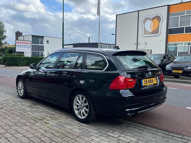 Occasion BMW 318 Luxury Line 143 PK (105 kW) 2011 Zwart Stationwagen