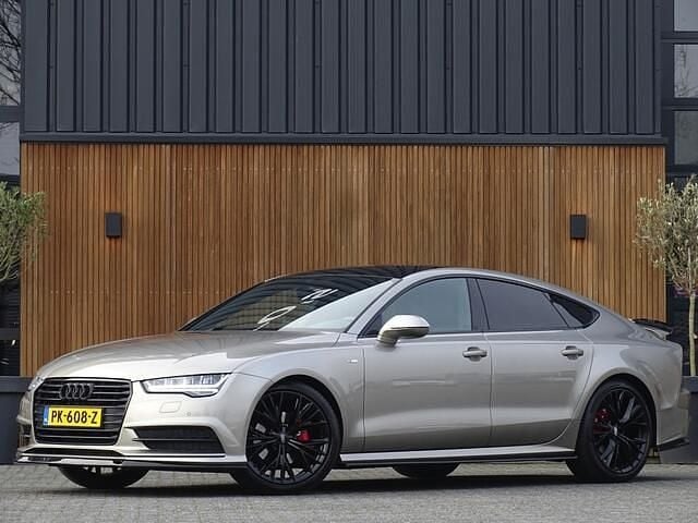 Geel Gebruikt 2018 Audi A7 S-Line Hatchback | € 29.995 - Afbeelding 1/4