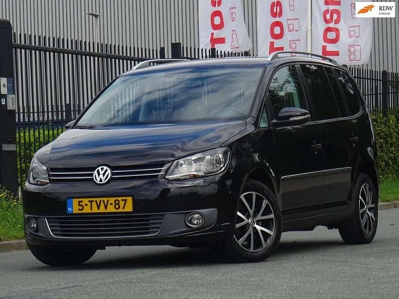 Zwart, metallic lak Gebruikt 2011 VW Touran Highline MPV | € 7.999 (Eerlijke prijs) - Afbeelding 1/4