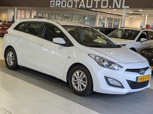 Wit Occasion 2014 Hyundai i30 Stationwagen | € 7.944 (Eerlijke prijs) - Afbeelding 1/4