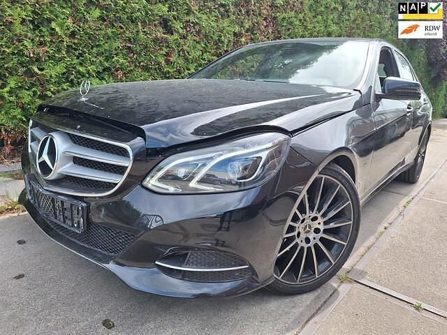 Zwart Occasion 2015 Mercedes E220 Ambition Sedan | € 6.800 (Eerlijke prijs) - Afbeelding 1/4
