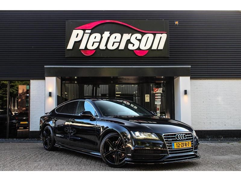 Zwart Gebruikt 2012 Audi A7 Hatchback | € 19.950 - Afbeelding 1/4