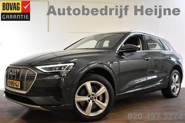 Grijs, metallic lak Gebruikt 2020 Audi e-tron Business SUV | € 24.745 (Super prijs) - Afbeelding 1/4