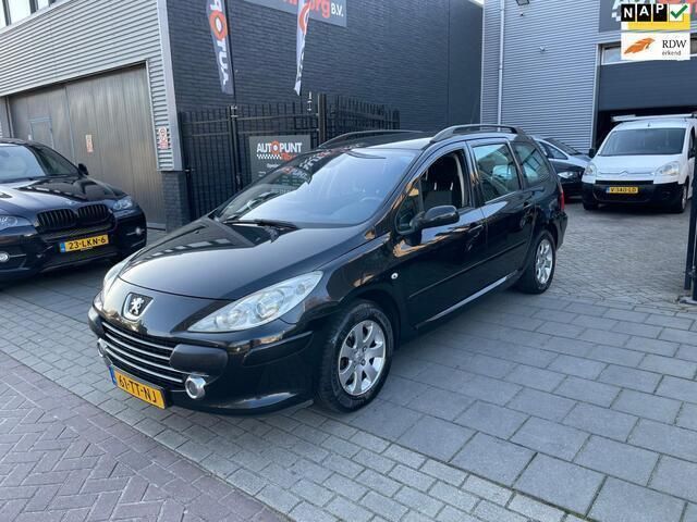 Zwart Gebruikt 2007 Peugeot 307 Premium Stationwagen | € 999 (Goede deal) - Afbeelding 1/4