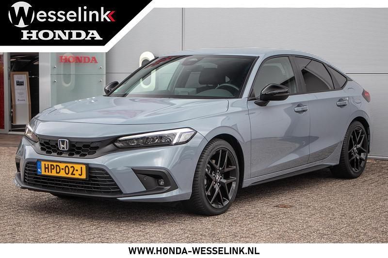 Grijs Gebruikt 2022 Honda Civic Sport Hatchback | € 33.950 (Eerlijke prijs) - Afbeelding 1/4